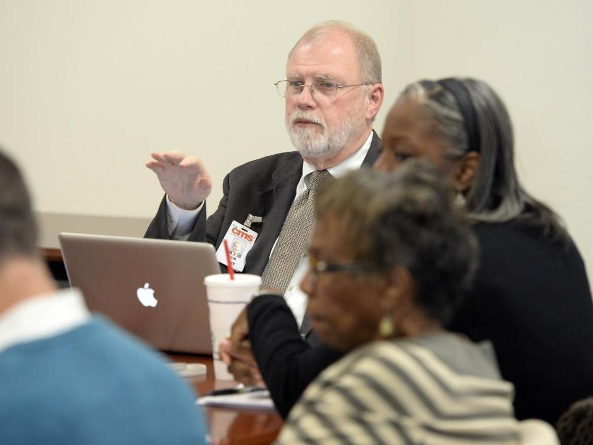 Tom Tate chairs a meeting of the CMS board’s policy committee in 2015, when division over student assignment was rife and progress seemed elusive.