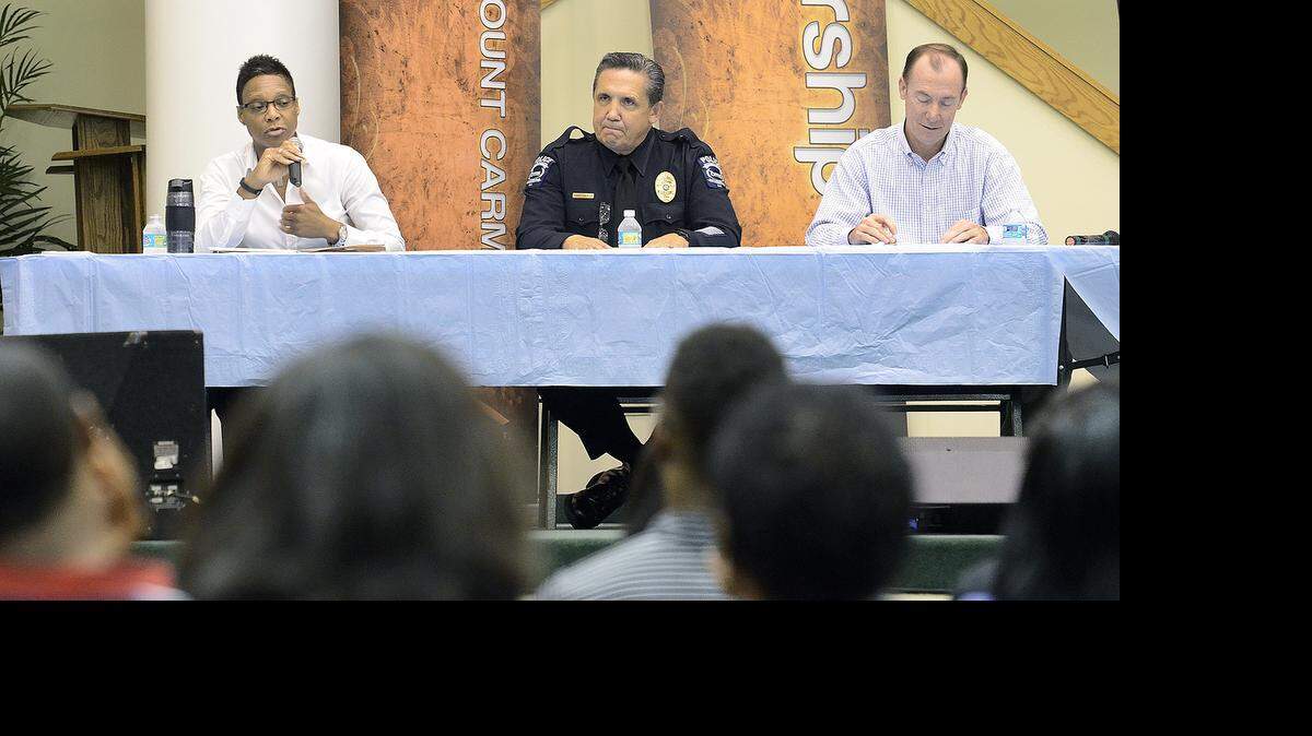 
(L-R) CMPD Major Sherie Pearsall, CMS Police Chief Randy Hagler and Kevin Tully, Mecklenburg County Public Defenders office were three of the eight member panel that had a discussion with the public at Mt. Carmel Baptist Church. The Charlotte chapter of Jack and Jill of America held a discussion Saturday about community interactions between minority youth and law enforcement and the justice system. 

