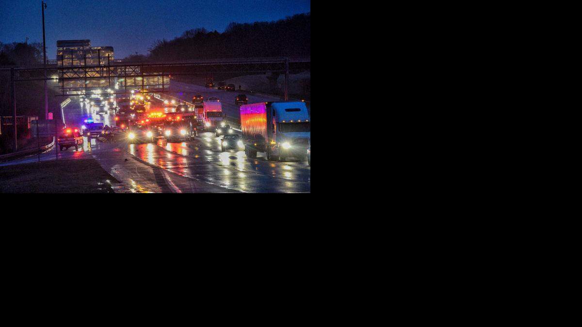 
Emergency workers and police at the scene of a multi-car collision that happened around 6:30PM on I-85 south bound near Sam Wilson road, southbound I-85 closed to one lane of travel on Monday Feb. 16, 2015.
