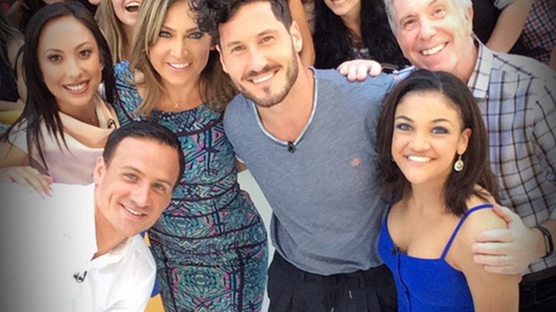 Ryan Lochte, left, poses with ‘Dancing With the Stars cast members Tuesday.