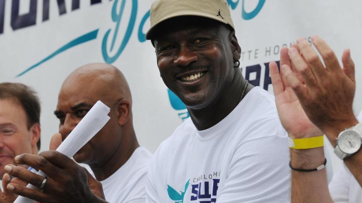 Michael Jordan celebrates during one of the Hornets service projects in the city. Jordan and the Hornets foundation have stepped up to help cover cost for the U.S. Paralympic Team Trials in Charlotte this week.