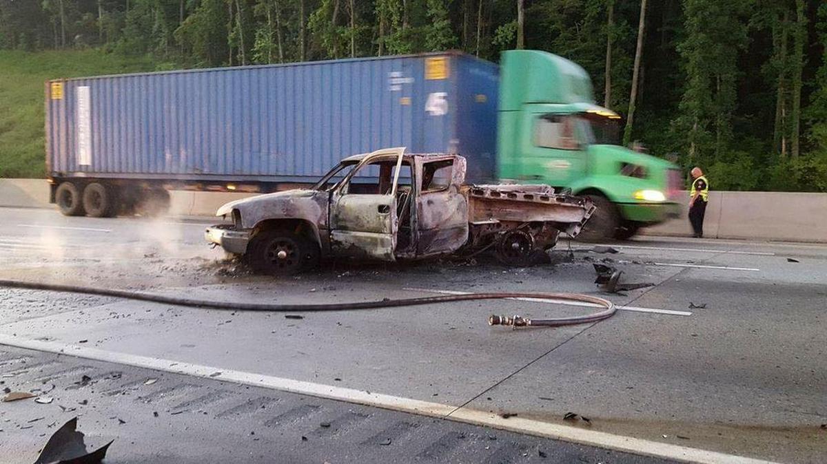 A pickup truck burst into flames after colliding with an 18-wheeler on Interstate 85 southbound near Kannapolis on Saturday morning.