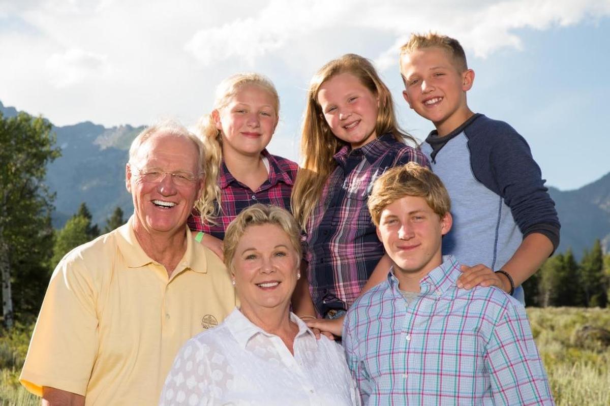 Marty Schottenheimer, one of the NFL’s winningest coaches, moved to Charlotte to be nearer family after his NFL coaching career ended. Pictured from left, Marty and his wife Pat Schottenheimer, and their grandchildren Catherine, 11, Savannah, 11, Brandon, 16, and Sutton, 12.