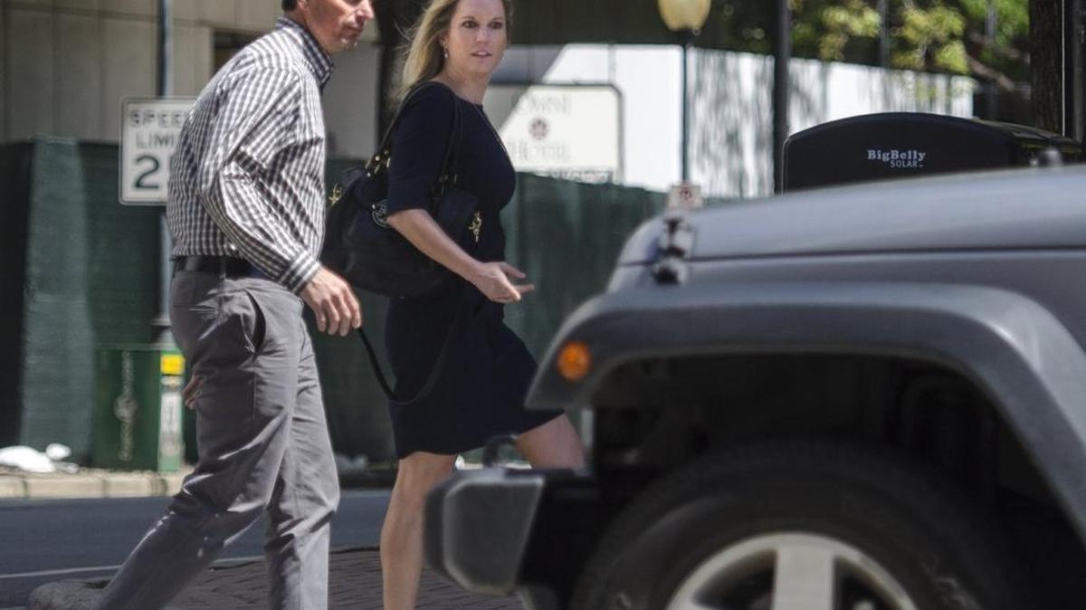 Pedestrians cross the street at College and Fourth streets in Charlotte. Pedestrian deaths by autos soared last year, and grew at the highest rate in 40 years, a new study found.