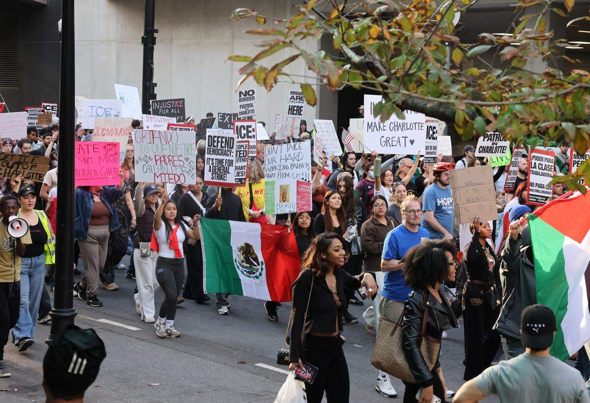 Protesters in uptown Charlotte march at the No Border Patrol protest on Saturday, Nov. 15, 2025.