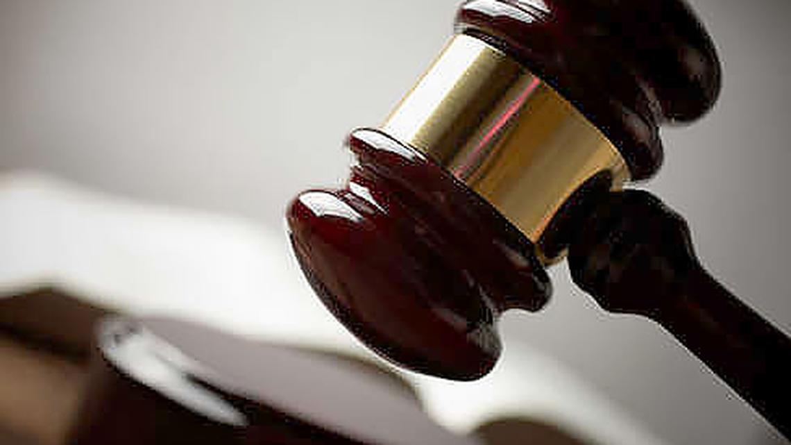 A supervisor had an employee shot to death after exposing how workers, who were living in US illegally, were underpaid in Georgia, feds say.