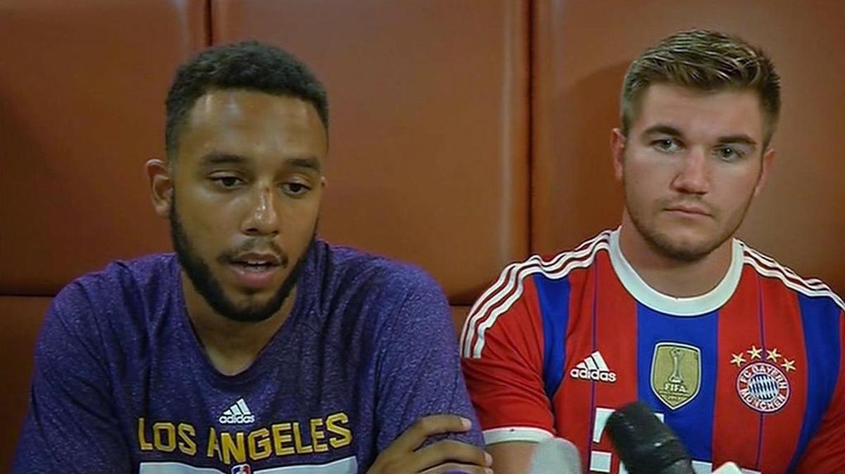 
In this image made from TV, Anthony Sadler, a senior at Sacramento State University, left, sits with Alek Skarlatos, US National Guardsman from Roseburg, Oregon, who both helped overpower high-speed train attacker, talk to the media early Saturday Aug. 22, 2015, in Arras, France. 
