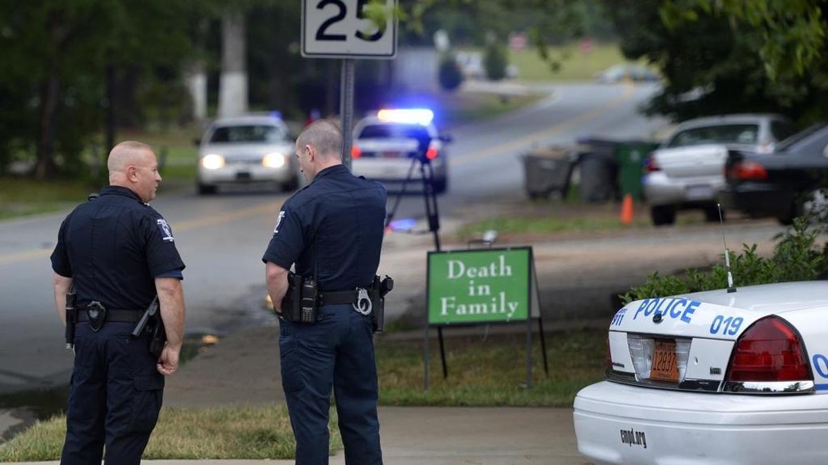 
The scene in the 4100 block of Atmore Street where police were searching for a man who was a person of interest in connection with a double fatal shooting in northeast Charlotte in June. Medic pronounced the victims dead at the scene. 
