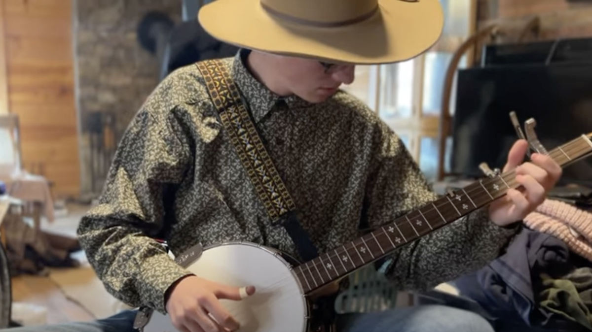 Aiden Hoglen plays music in a video taken by his mother, Sabrina Greene-Rusk, on Feb. 14. Hoglen died less than two weeks later after a battle with Type B Flu.