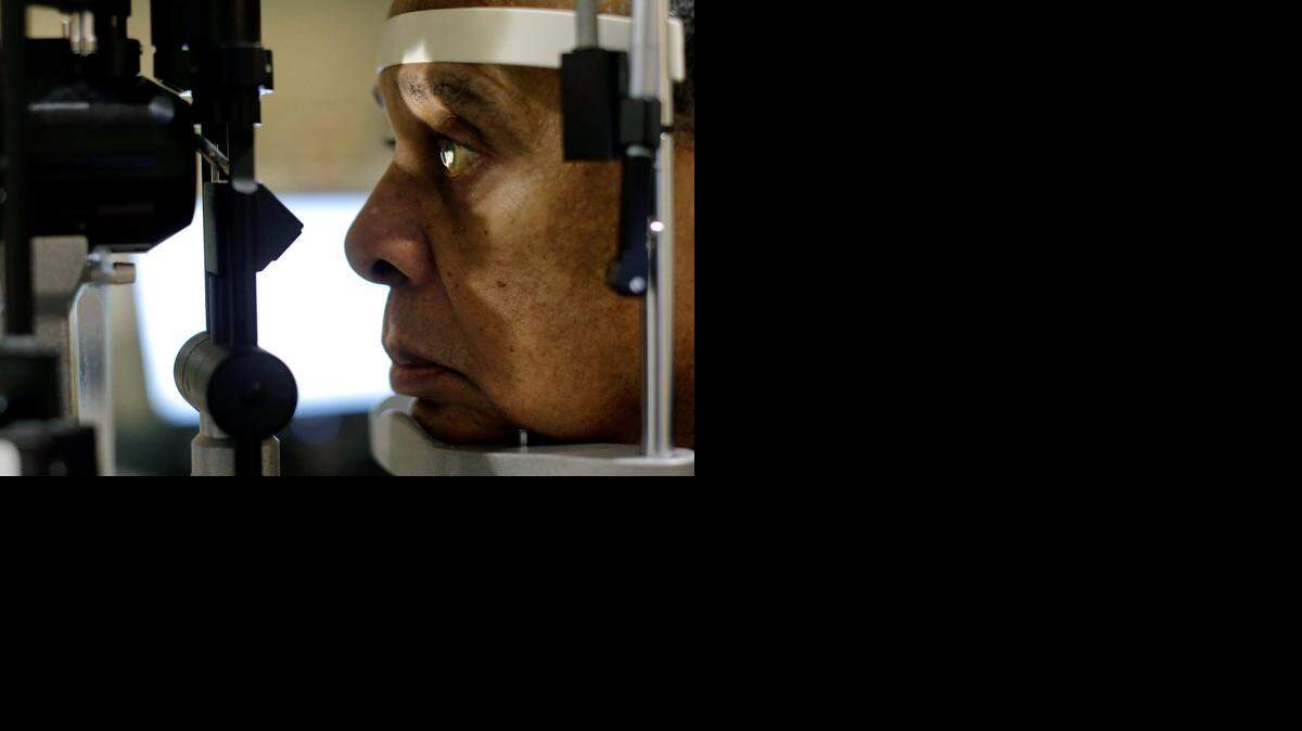 U.S. Army veteran Kenneth Chavis undergoes a glaucoma examination at the Fayetteville Veterans Affairs Medical Center. The Fayetteville VA hopes to celebrate its 75th anniversary this fall with the opening of a new outpatient health care center that could ease chronic delays.