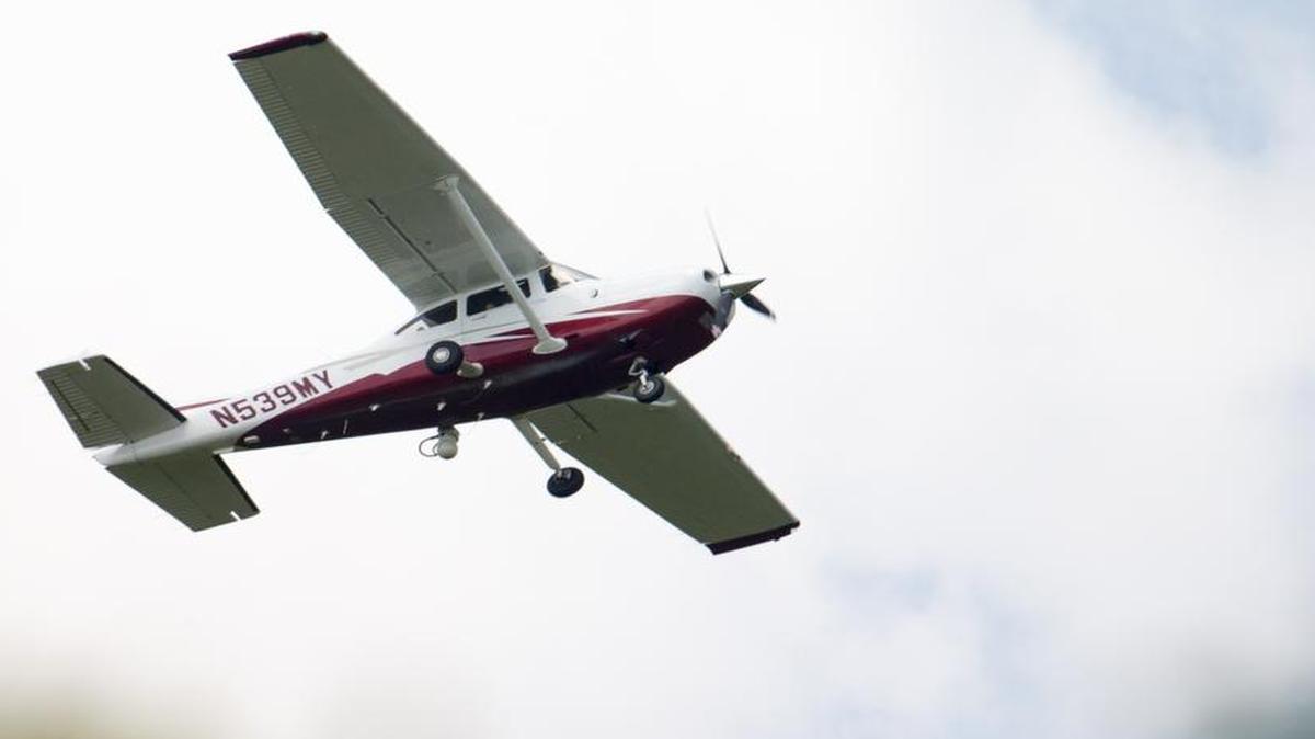 
A small plane flies near Manassas Regional Airport in Manassas, Va., on May 26, 2015. The plane is among a fleet of surveillance aircraft by the FBI, which are primarily used to target suspects under federal investigation. Such planes are capable of taking video of the ground, and some _ in rare occasions _ can sweep up certain identifying cellphone data. 
