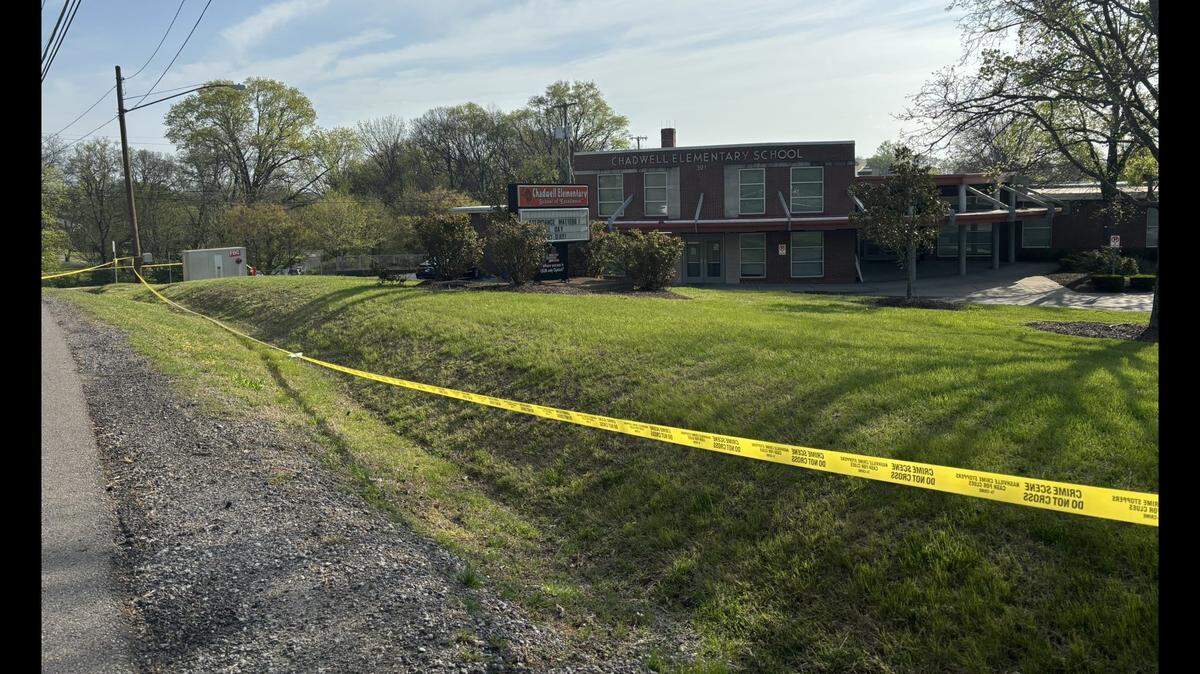 An elementary school custodian was killed by her estranged husband outside her work before students arrived, Nashville police said.
