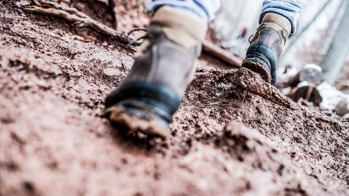 Bystanders guided firefighters to the trapped fisherman, who was mired up to his waist in a mud flat.