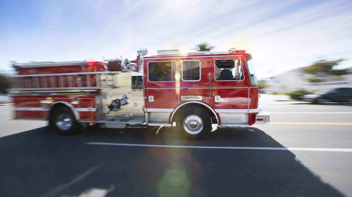 A fire truck driver is facing charges after running a red light and crashing into a car, killing a man and woman in Magnolia, New Jersey, prosecutors say.