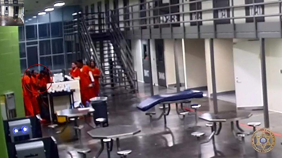 Inmates at a Nashville detention center were seen helping save the life of a correctional officer who began choking.