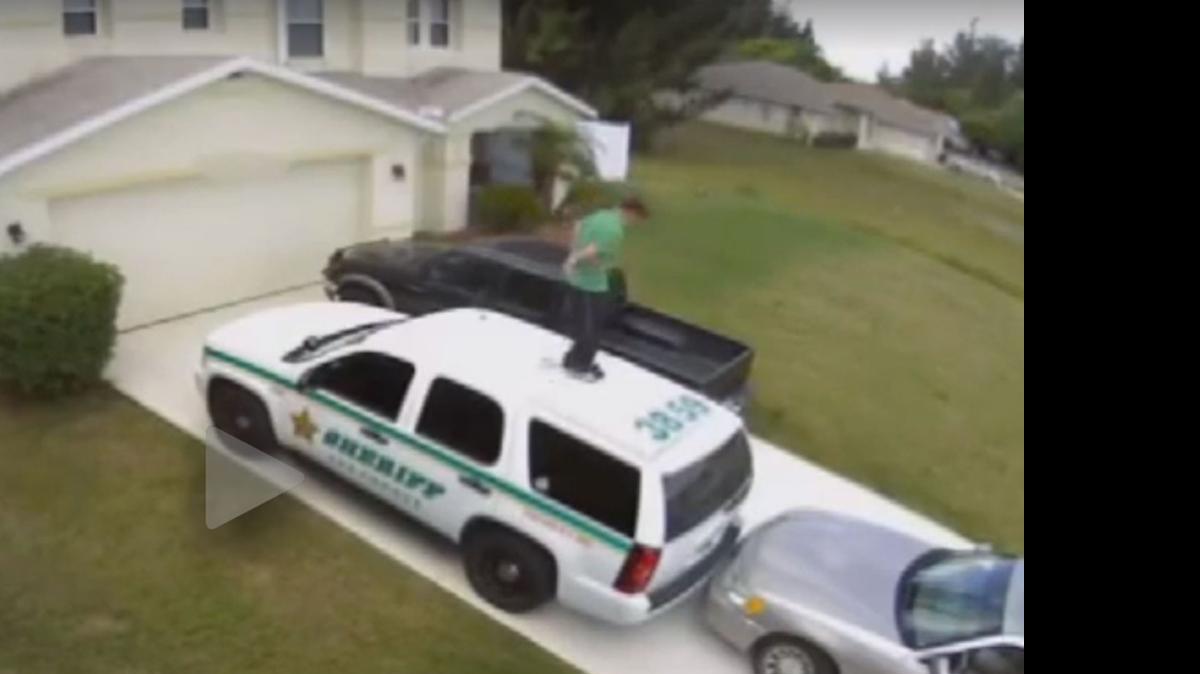 
Lee County authorities say Christian Radecki told authorities he danced on the sheriff’s SUV after being ‘threatened’ by vampires.
