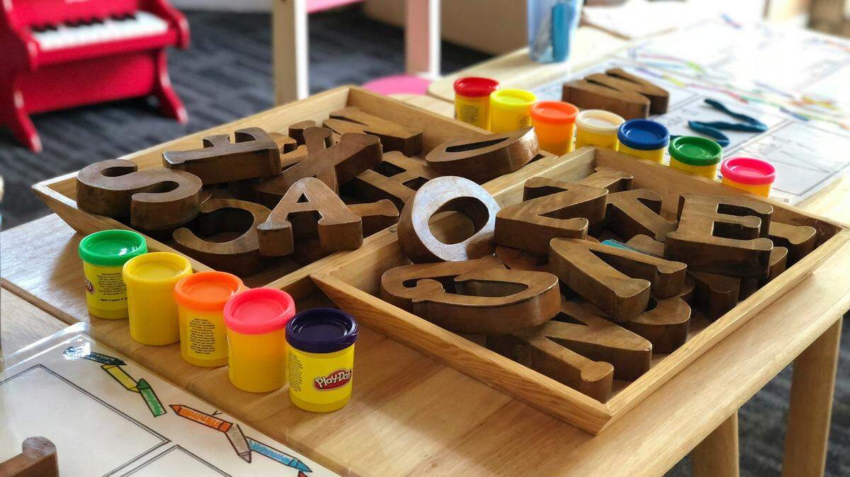 A preschool teacher has been suspended without pay for 15 days following accusations that she pushed students in the cafeteria, the Tennessee school district said.
