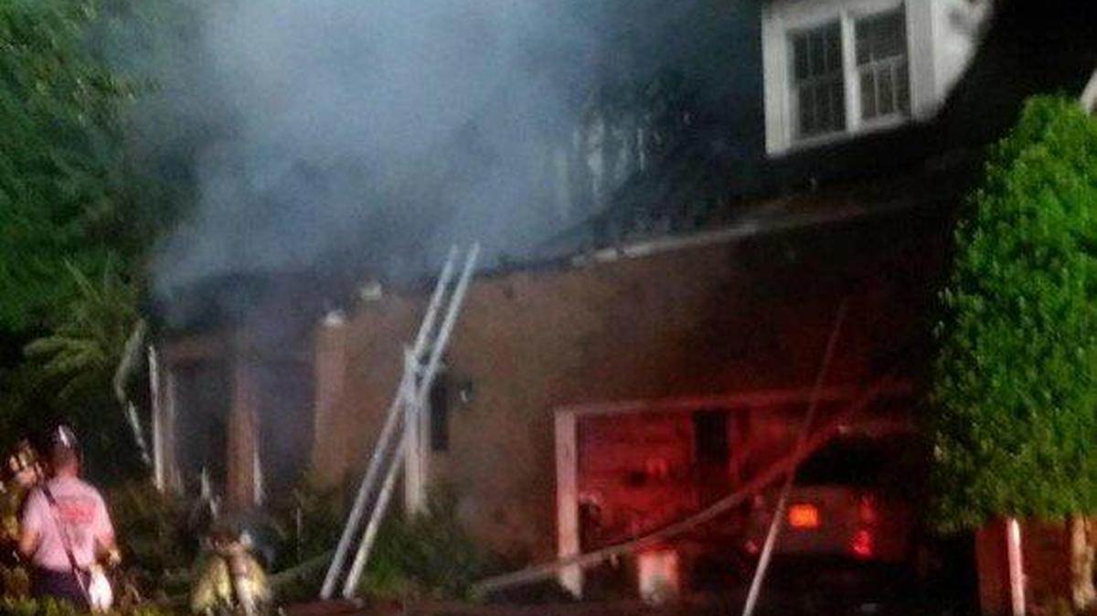 The second floor of a house on Whispering Wind Drive partially collapsed during the fire.