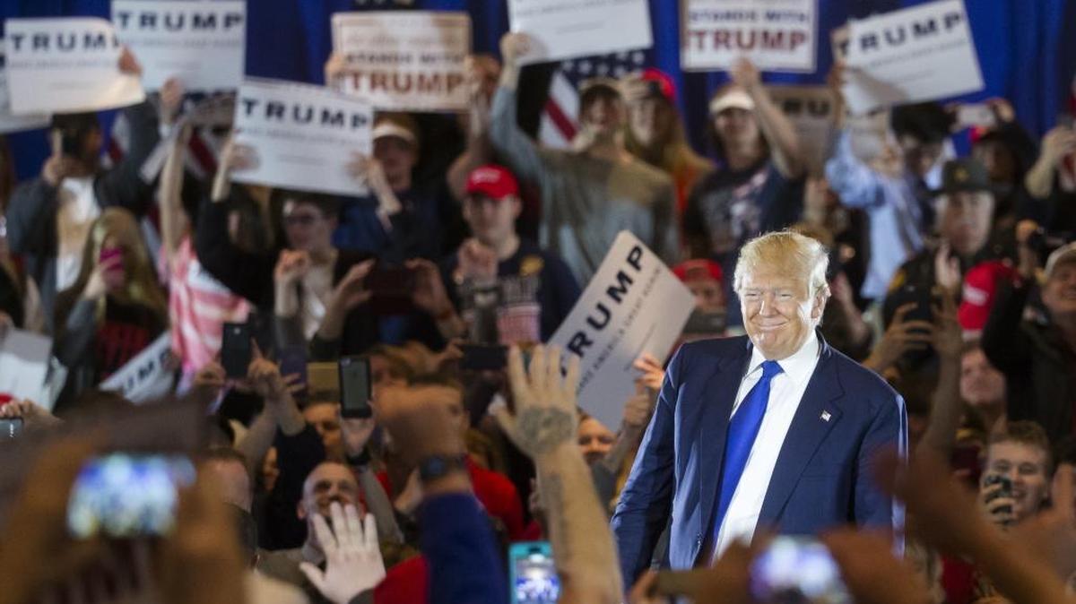 Republican presidential candidate Donald Trump smiles as he speaks during a campaign stop at the Savannah Center, Sunday, March 13, 2016, in West Chester, Ohio. (AP Photo/John Minchillo)