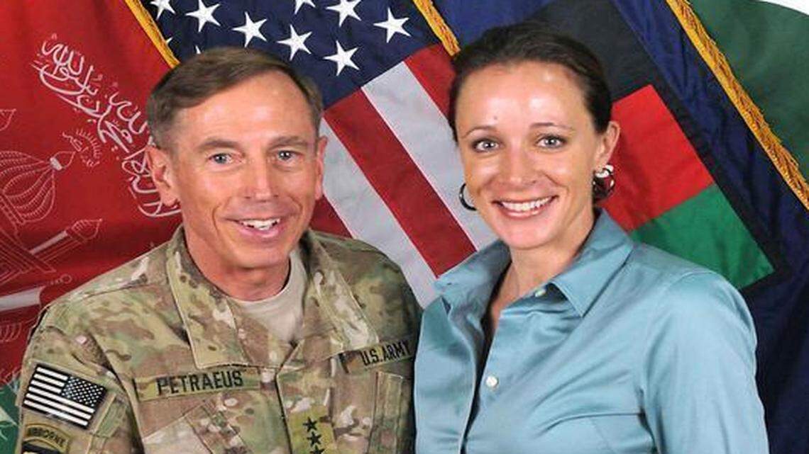 
Gen. David Petraeus was commander of the U.S. and NATO forces in Afghanistan when he shook hands with his biographer, Paula Broadwell, for this photo on July 13, 2011. Their later affair led eventually 
to his resignation as CIA director.
