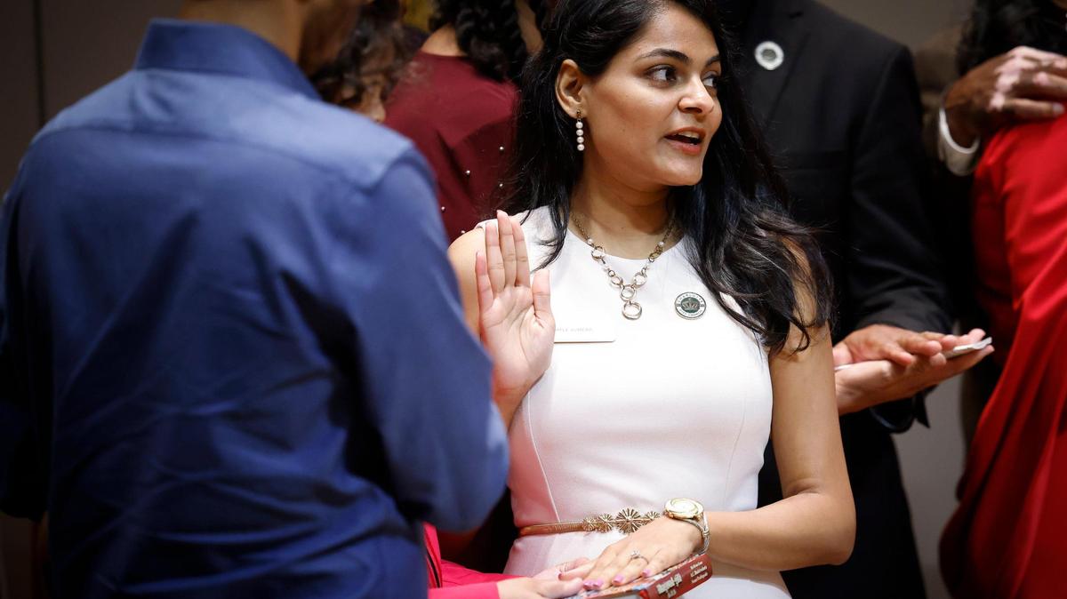 At-large Charlotte City Council Member Dimple Ajmera takes the oath of office at the Charlotte-Mecklenburg Government Center in Charlotte, N.C., Tuesday, Sept. 6, 2022.