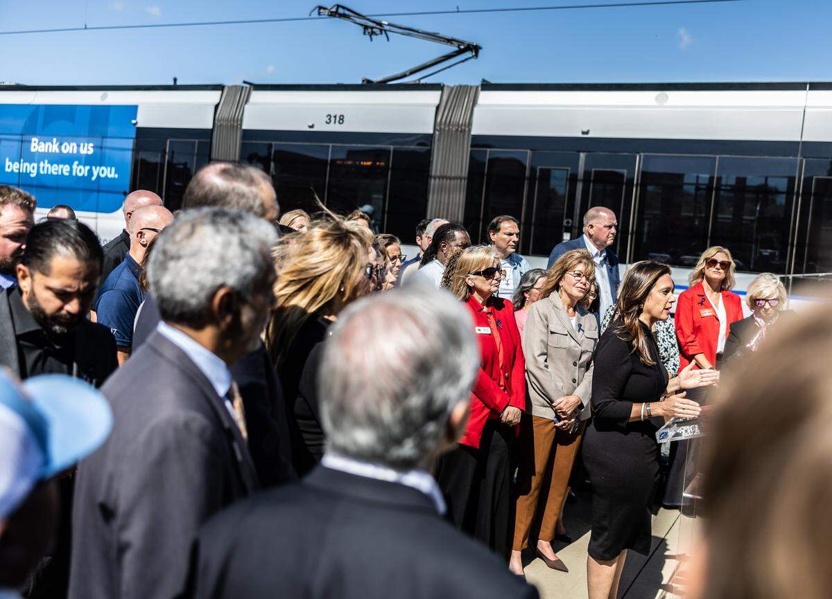 Republican City Council District 6 candidate Krista Bokhari speaks during a news conference at the Lynx Blue Line Parkwood Station in Charlotte.