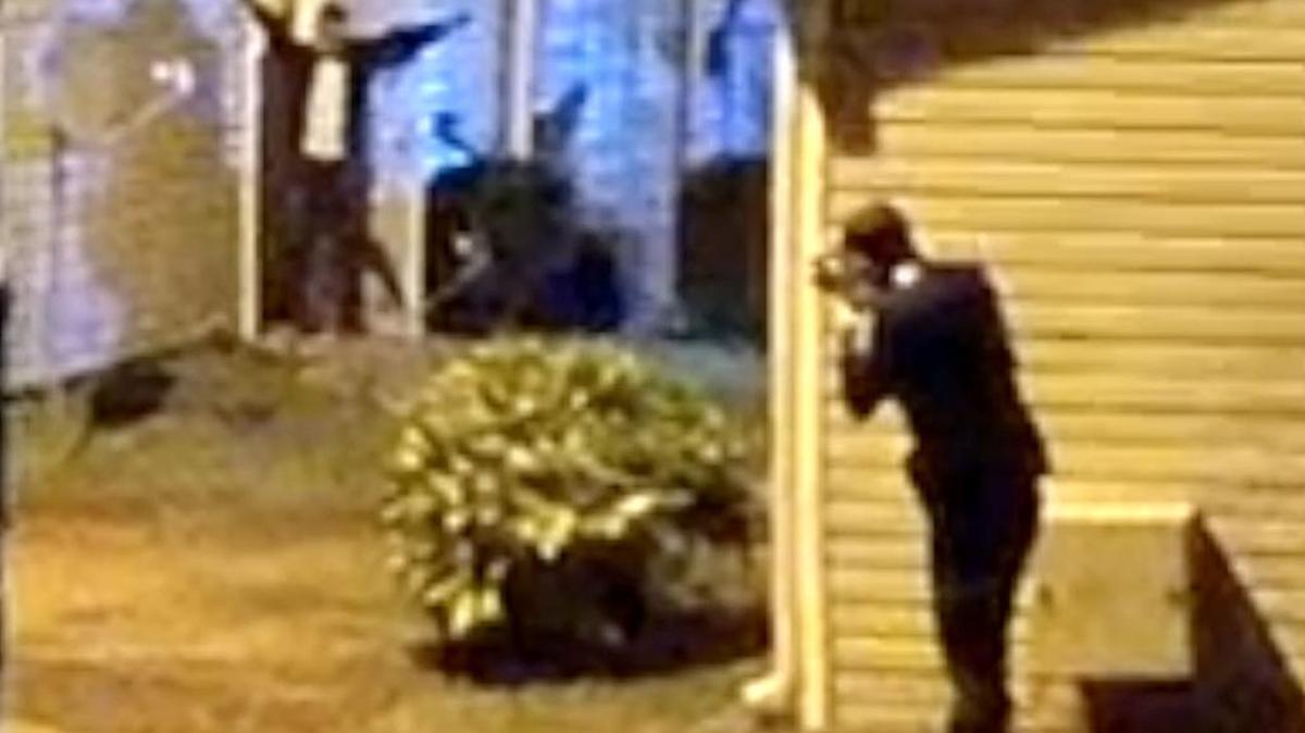 This image taken from the body camera of a Charlotte-Mecklenburg Police officer shows an officer about to fatally shoot Ruben Galindo outside his apartment.