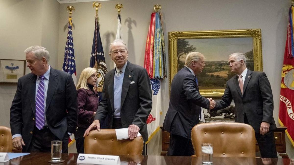 From left, Sen. Lindsey Graham, R-S.C., Secretary of Homeland Security Kirstjen Nielsen, Sen. Chuck Grassley, R-Iowa, President Donald Trump, and Sen. Thom Tillis, R-N.C., arrive for a meeting on immigration in the Roosevelt Room at the White House, Thursday, Jan. 4, 2018, in Washington.