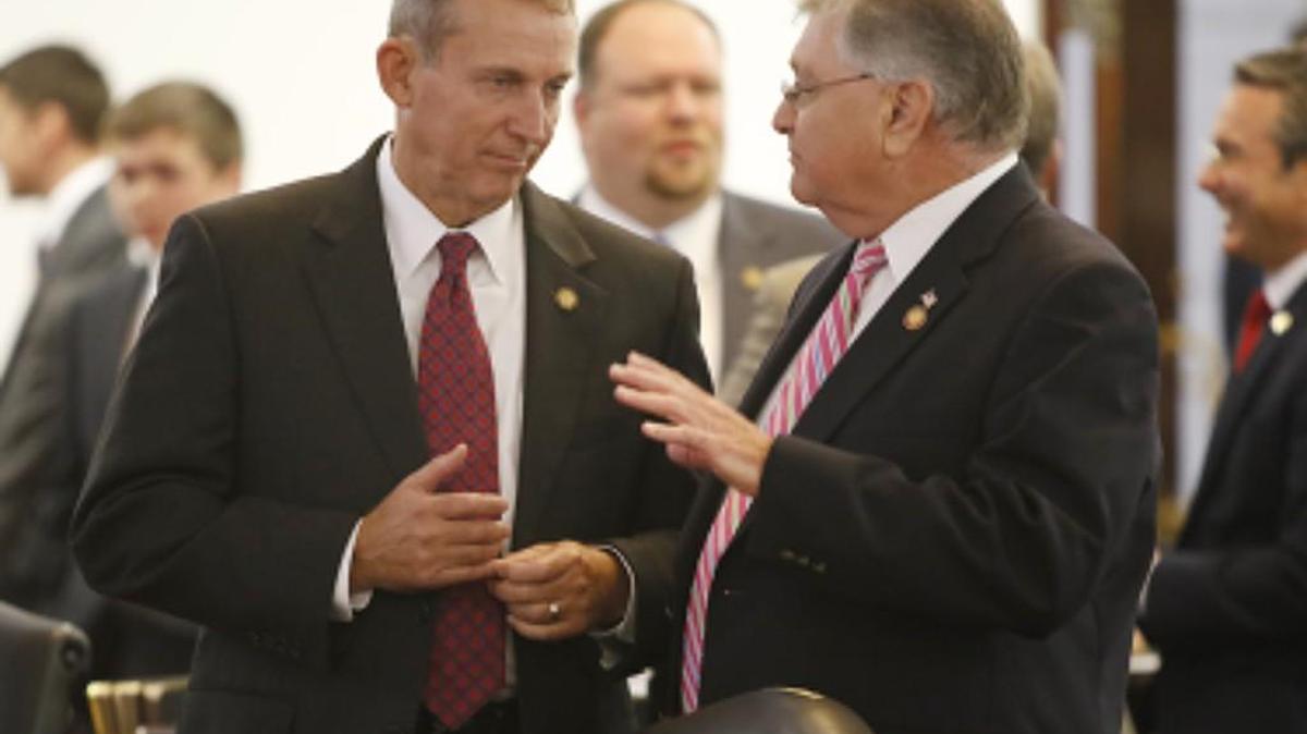 
From left, Republican NC Senator Harry Brown and Republican NC House member Phil Shepard talked on the floor of the NC Senate Wednesday afternoon, September 16, 2015 shortly before the Senate vote on HB97 NC House/Senate budget compromise bill. The vote was 37 ayes to 13 nays to pass HB97. The NC House and Governor are the next steps for the compromise budget bill. Brown rose to speak first during the short session urging passage of HB 97.
