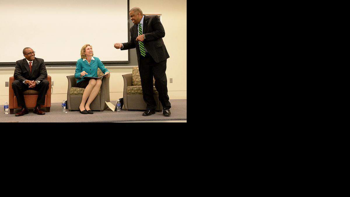 
Democratic mayoral candidates Michael Barnes, left, Jennifer Roberts, center, and David Howard, right, during a mayoral forum on April 9, 2015 at UNC Charlotte featuring three of the four Democratic candidates running for mayor. The forum, hosted by the UNCC College Democrats, was held at the Fretwell Building at UNC Charlotte. The candidates answered student submitted questions, and there was a student moderator. 
