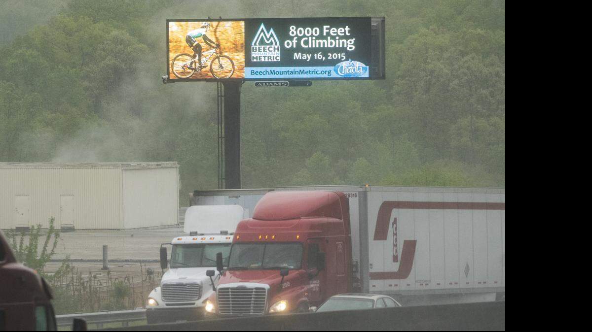 
Traffic moves by an electronic billboard on Interstate 85 between Gastonia and Belmont near McAdenville. A bill would make it easier for billboard firms to convert signs into digital screens and would limit local governments’ ability to regulate billboards’ placement.

