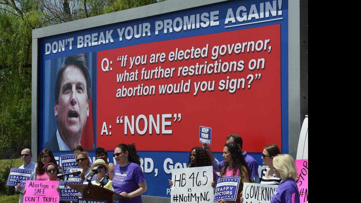 
Shoshannah Sayers, Executive Director of NARAL, speaks at a news conference at Charlotte's Pearle Street Park, Monday, May 04, 2015. Planned Parenthood and NARAL, plus local medical professionals and concerned citizens held the news conference to launch a statewide tour of a 20-foot billboard urging Gov. McCrory to veto any new abortion legislation.
