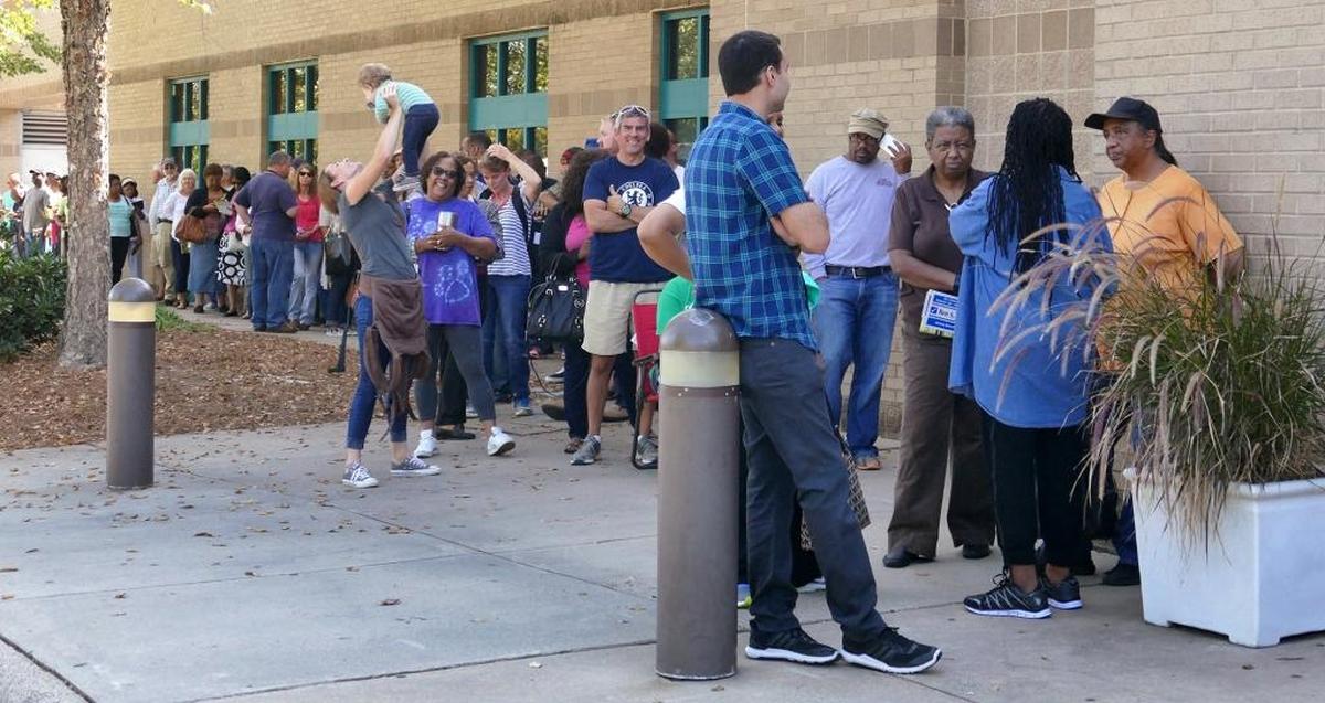 A voter-fraud group has called on President Trump to rescind Andrew Murray’s nomination as U.S. Attorney, claiming that the Mecklenburg District Attorney has refused to prosecute two cases of voter fraud. Murray says the allegations are untrue and that in the cases cited, no crime occurred. The photograph shows an early-voting line in 2016.
