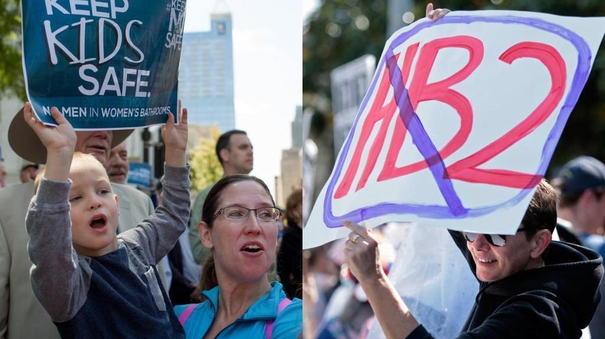 Mandy Gainey, holds her son Connor Gainey, 4, during a House Bill 2 support rally on the Capitol grounds April 11, 2016 in Raleigh, left, and HB2 protestor Connie Jones of Raleigh, right, on North Blount Street across from the NC Governor's Mansion on April 2, 2016.