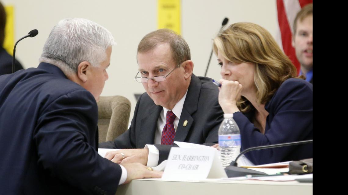 
Sen. Tom Apodaca, left, confers with Sen. Harry Brown, center, and Sen. Kathy Harrington as the state Senate worked on its budget last week. The budget calls for ending healthcare benefits for future state retirees.

