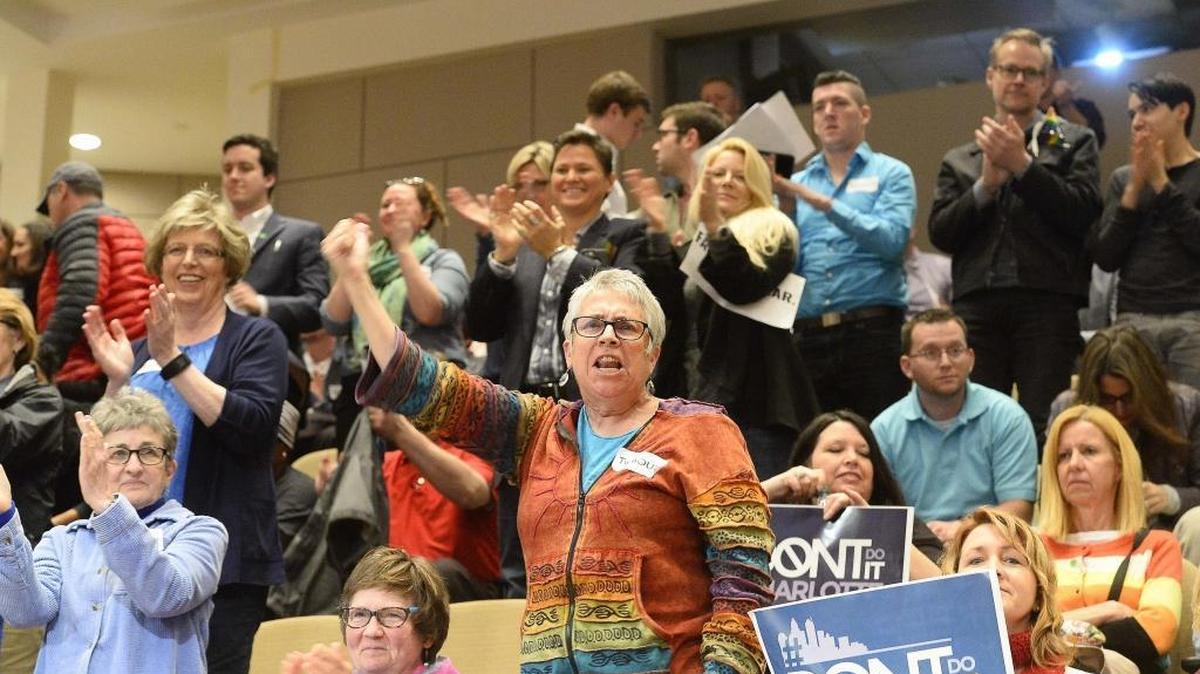 People in favor of the nondiscrimination ordinance passing cheer after council votes 7-4 to approve the nondiscrimination ordinance at Monday's city council meeting Feb. 22, 2016. Four council members met Tuesday with legislative leaders in Raleigh to try and resolve the impasse between the city and state.