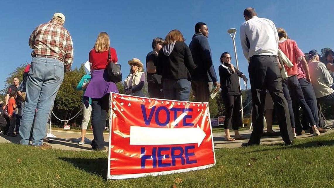 Voters wait in line for early voting at the Lake Lynn Community Center in Raleigh, N.C. Wednesday, October 26, 2016.