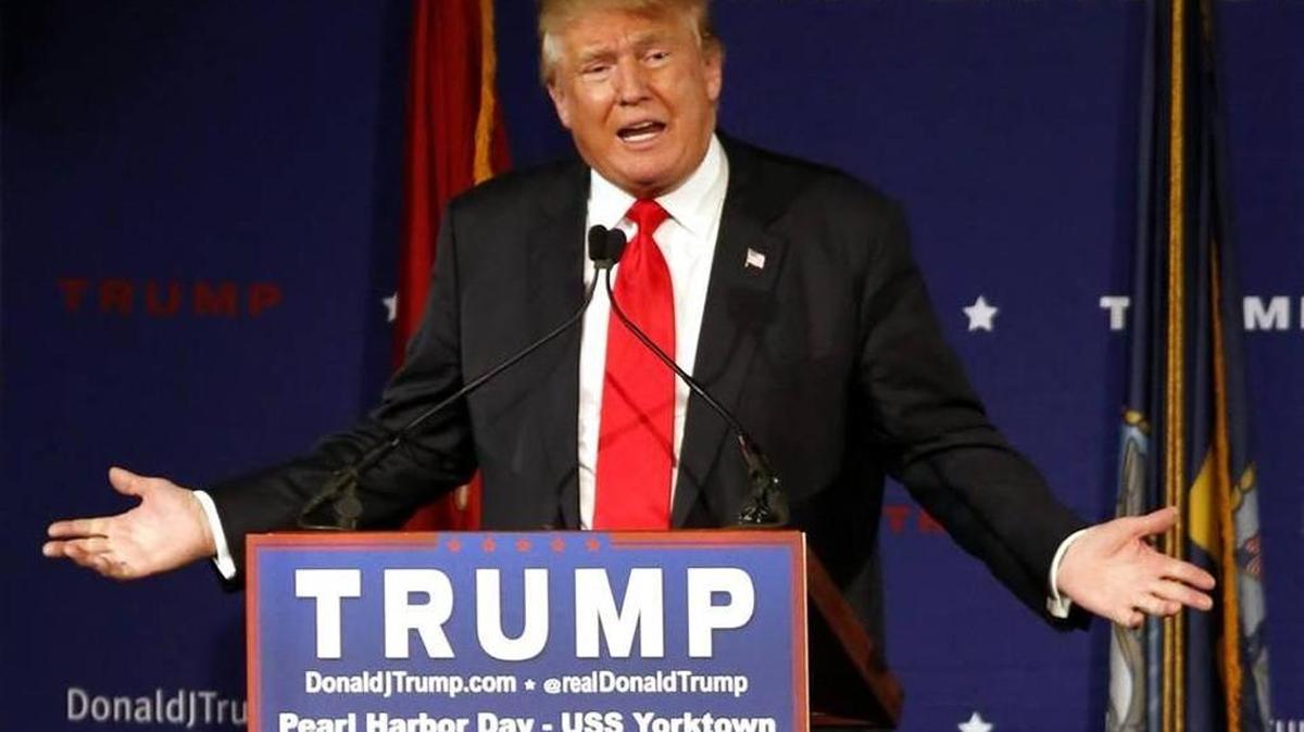 Republican presidential candidate Donald Trump speaks aboard the aircraft carrier USS Yorktown in Mt. Pleasant.