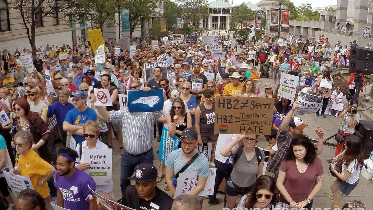 Several hundred people from the Moral Monday group crowd the Bicentennial Mall calling for the repeal of HB2 in Raleigh, N.C. Monday, April 25, 2016.