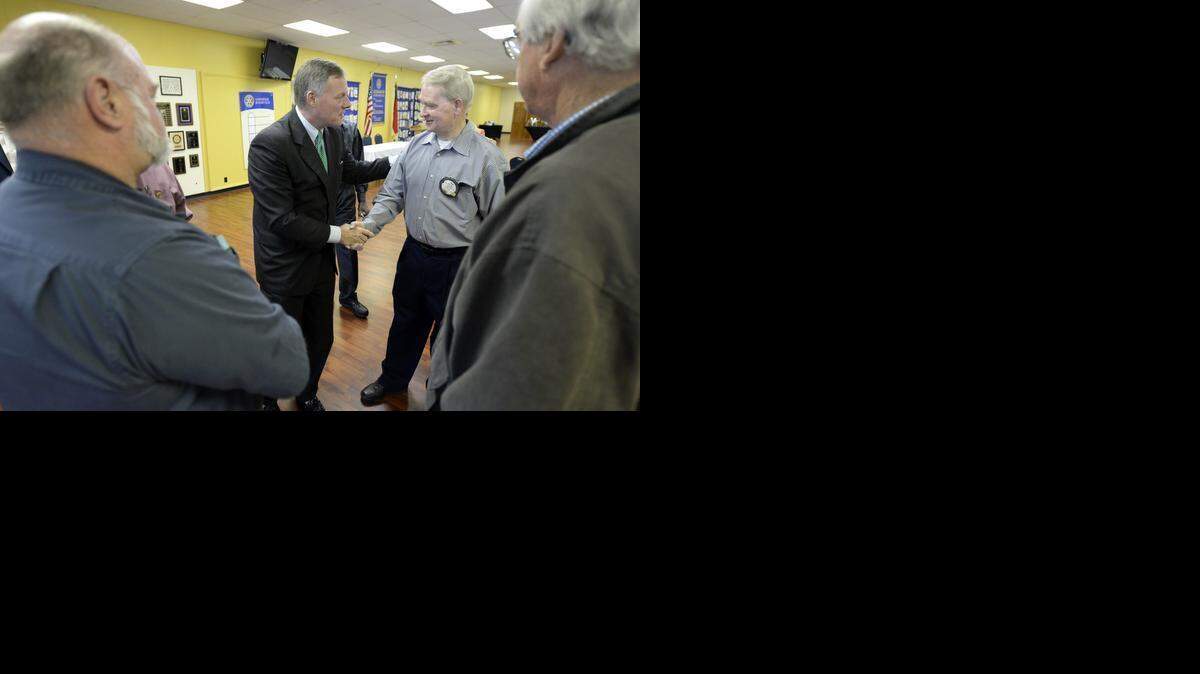 
U.S. Senator Richard Burr, R-N.C.,  is greeted by Dan Gray at the Kannapolis Rotary Club on Tuesday. Burr criticized a proposed nuclear deal with Iran. 
