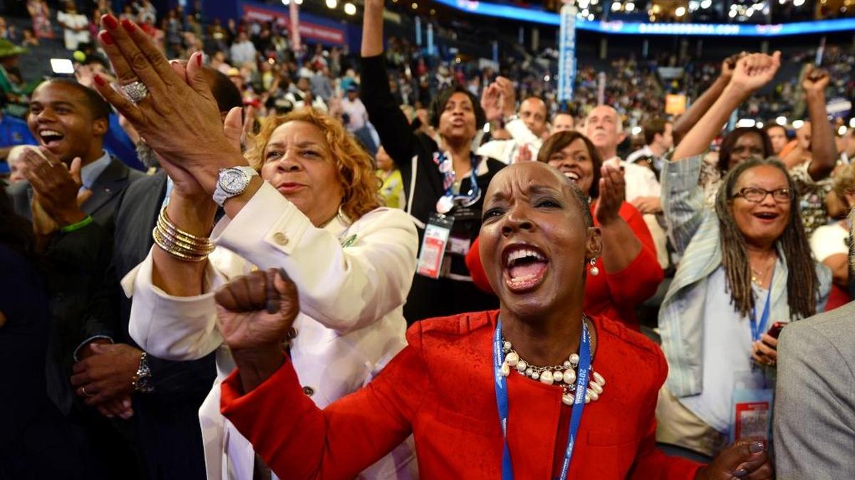 Brenda Wilkins of Williamston, NC (left) and Denise Adams of Winston Salem, NC celebrate as the DNC kicks off in the Time Warner Cable Arena in Charlotte, NC, Tuesday, Sept. 4, 2012. Playing a big role at the Democratic conventions are superdelegates, the 712 party and elected officials who make up 30 percent of the delegates needed to win the nomination.