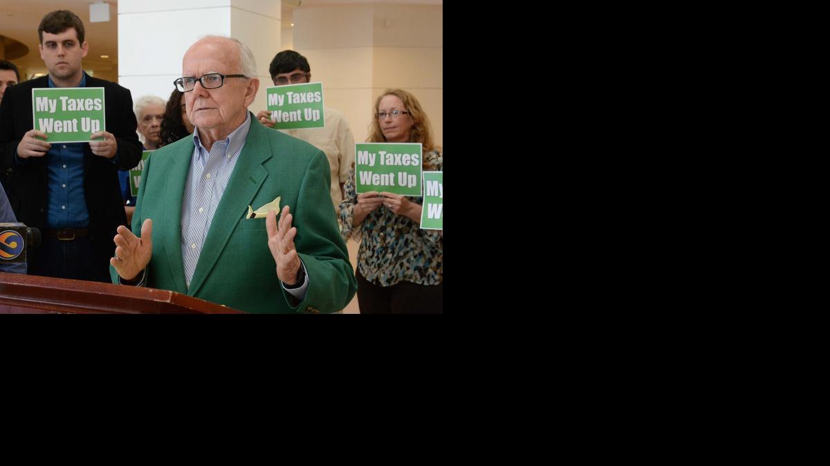
 Brian McManus 74, of Matthews is worried that he will not be able to deduct long term health care costs, while speaking at the "Tax Hike Truth Tour" during a press conference held at the Charlotte-Mecklenburg Government Center April 08, 2015.

