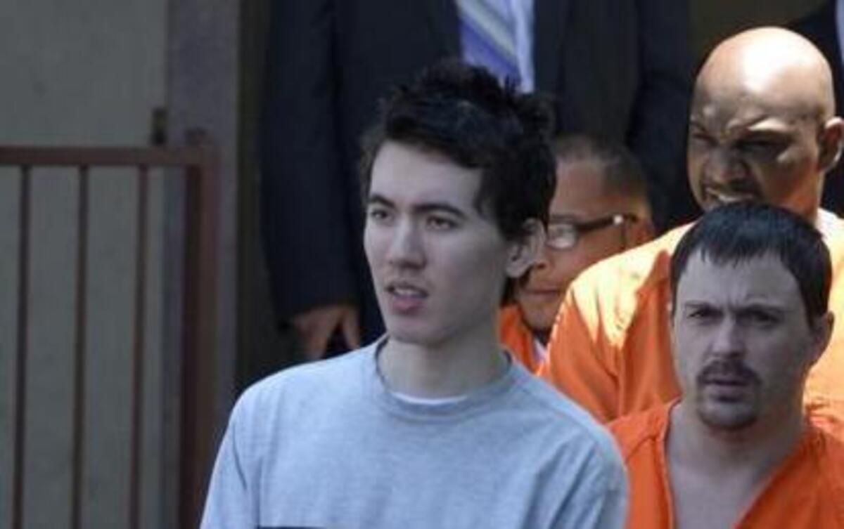 Justin Nojan Sullivan, shown leaving the federal courthouse in Charlotte shortly after his June 2015 arrest, is now accused of conspiring online with a notorious ISIS leader based in Syria.