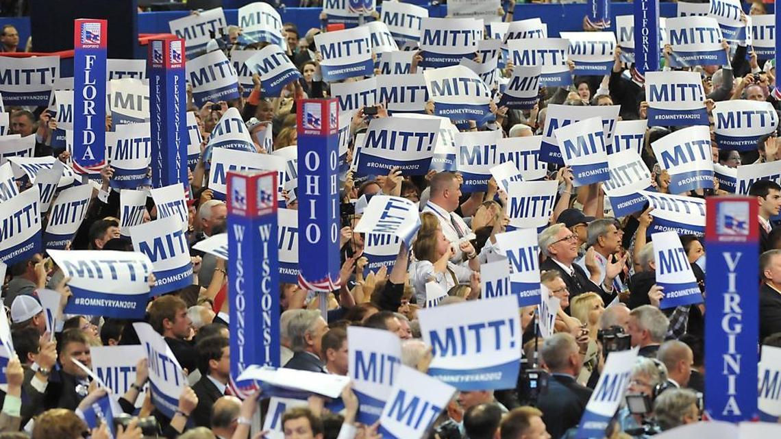 Delegates cheer as their votes put Mitt Romney over the top at the Republican National Convention in Tampa, Florida Tuesday, August 28, 2012. Charlotte is bidding on the 2020 RNC.