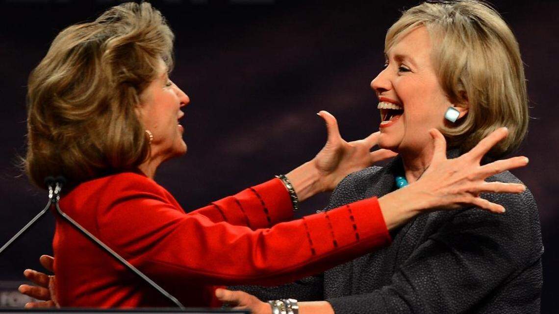 Kay Hagan, left, hugs Hillary Clinton at the Charlotte Convention Center during Hagan’s unsuccessful Senate re-election campaign, Oct. 25, 2014.