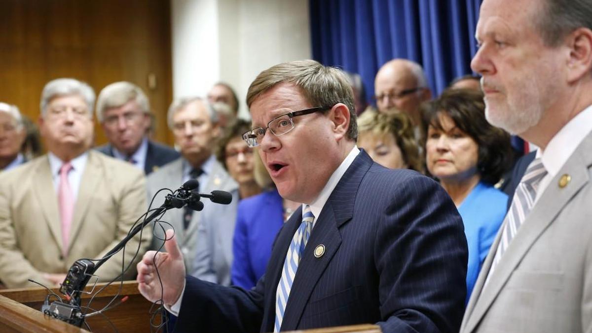 
Speaker of the House Tim Moore, center, and Senate Pro-tem Phil Berger, right, announced that the two sides have reached a budget agreement at a press conference held at the State Legislature in Raleigh on Monday, Sept. 14, 2015.
