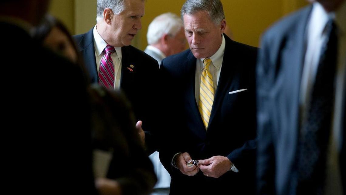 Sen. Thom Tillis, R-N.C., left, and Sen. Richard Burr, R-N.C., right, walk from a policy luncheon on Capitol Hill in Washington, July 8, 2015.
