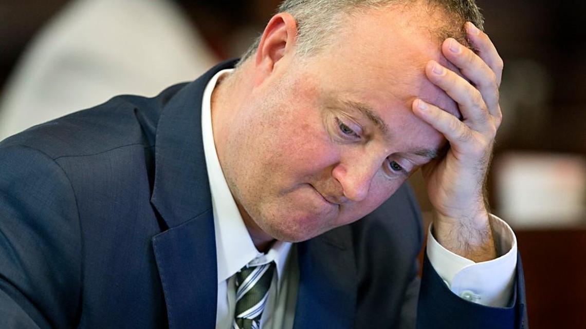 State Rep. Darren Jackson, a Knightdale Democrat, works at his desk during a special session in February.