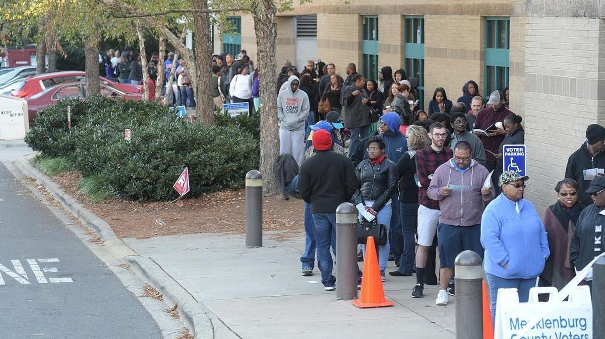 Voters waited in long lines Saturday morning at University City Regional Library for the last day of early voting, contributing to a record 3 million North Carolinians who already have voted.