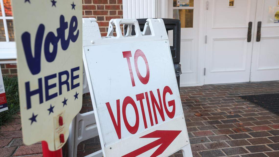 Signs are placed outside Providence Baptist Church, indicating where voters can enter precinct 36 and cast their ballot for the election in Charlotte, NC on Tuesday, November 4, 2025.